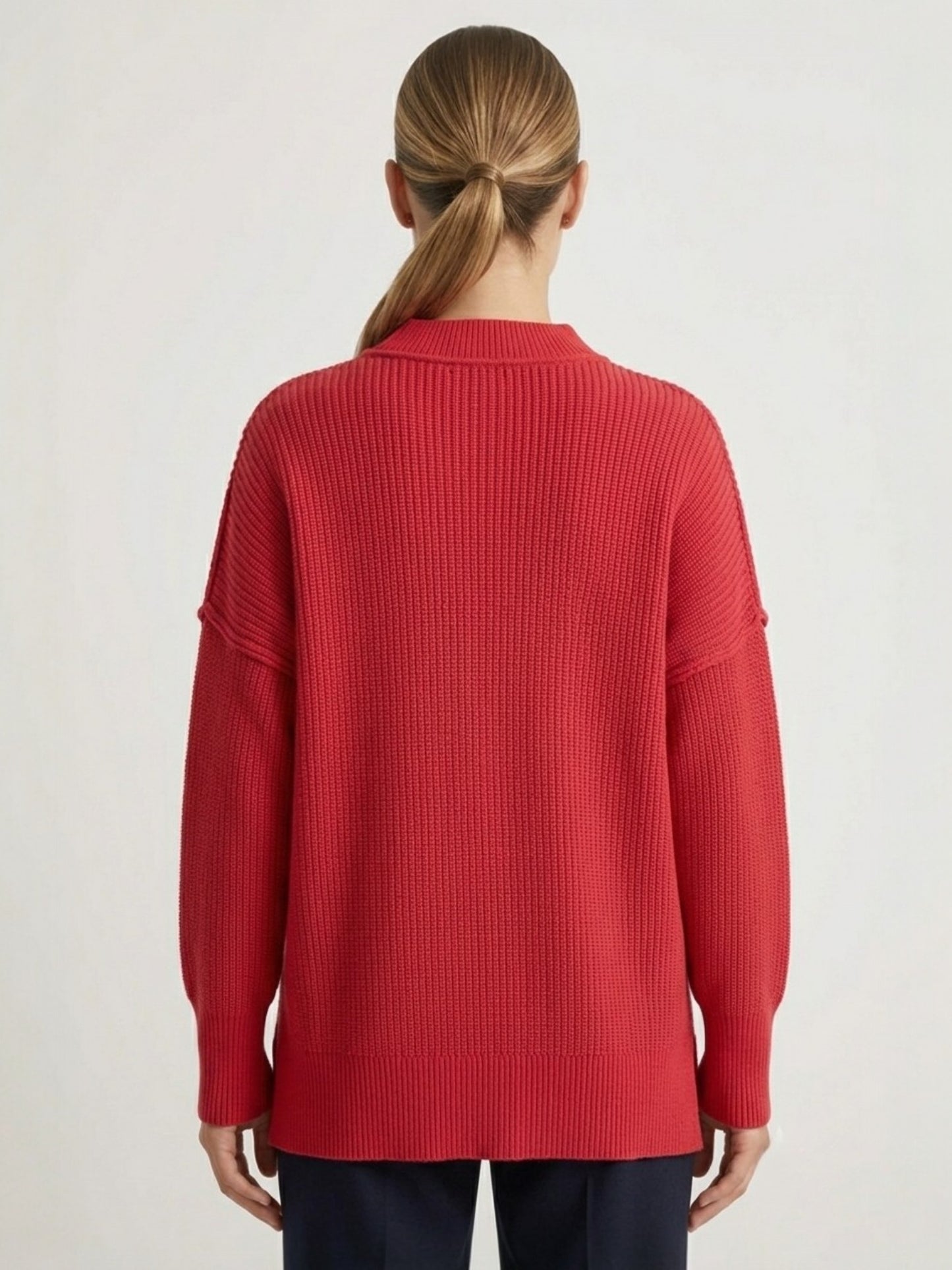 Oversized mock neck ribbed knit sweater in red, back view