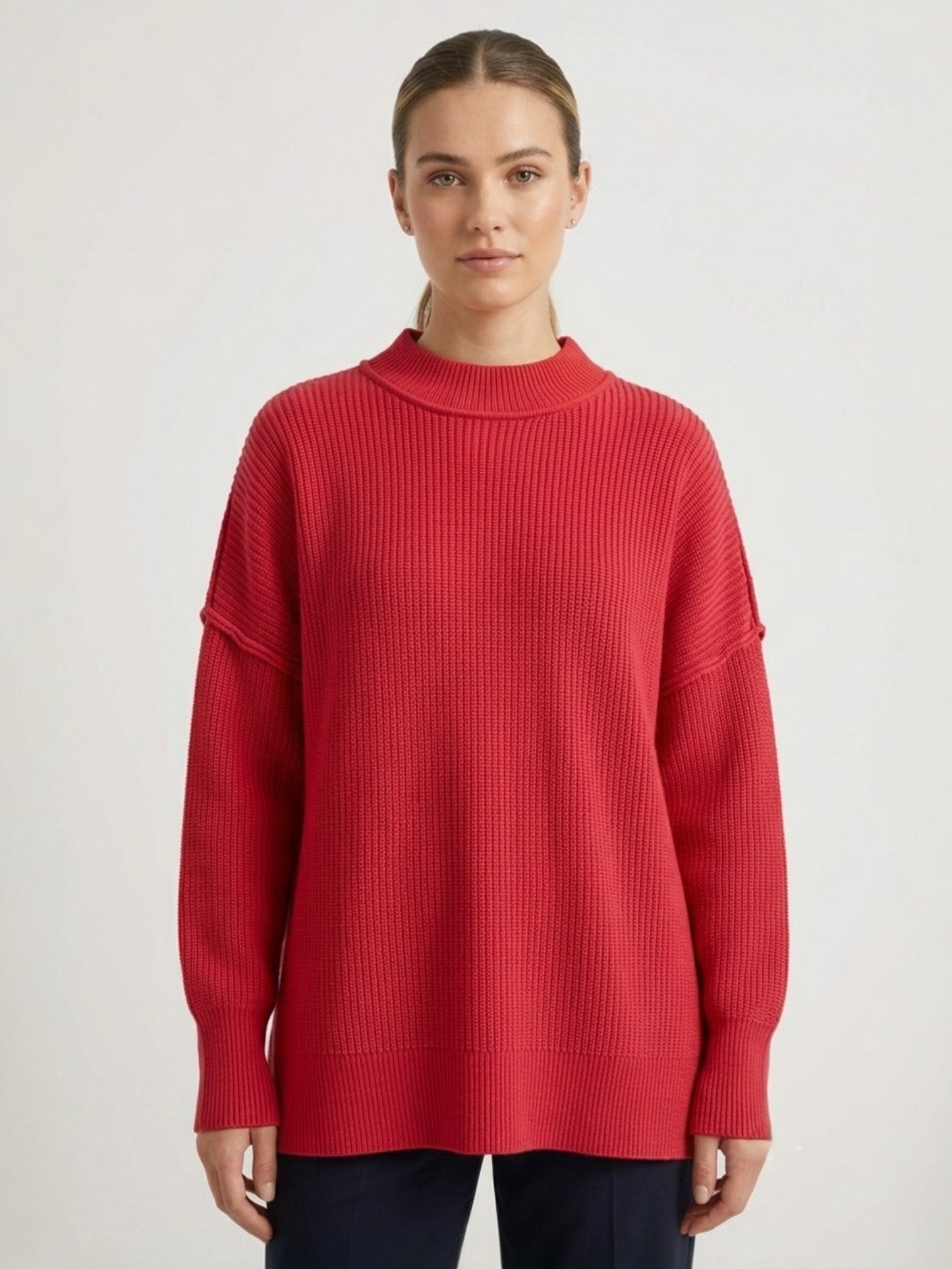 Oversized mock neck ribbed knit sweater in red, front view