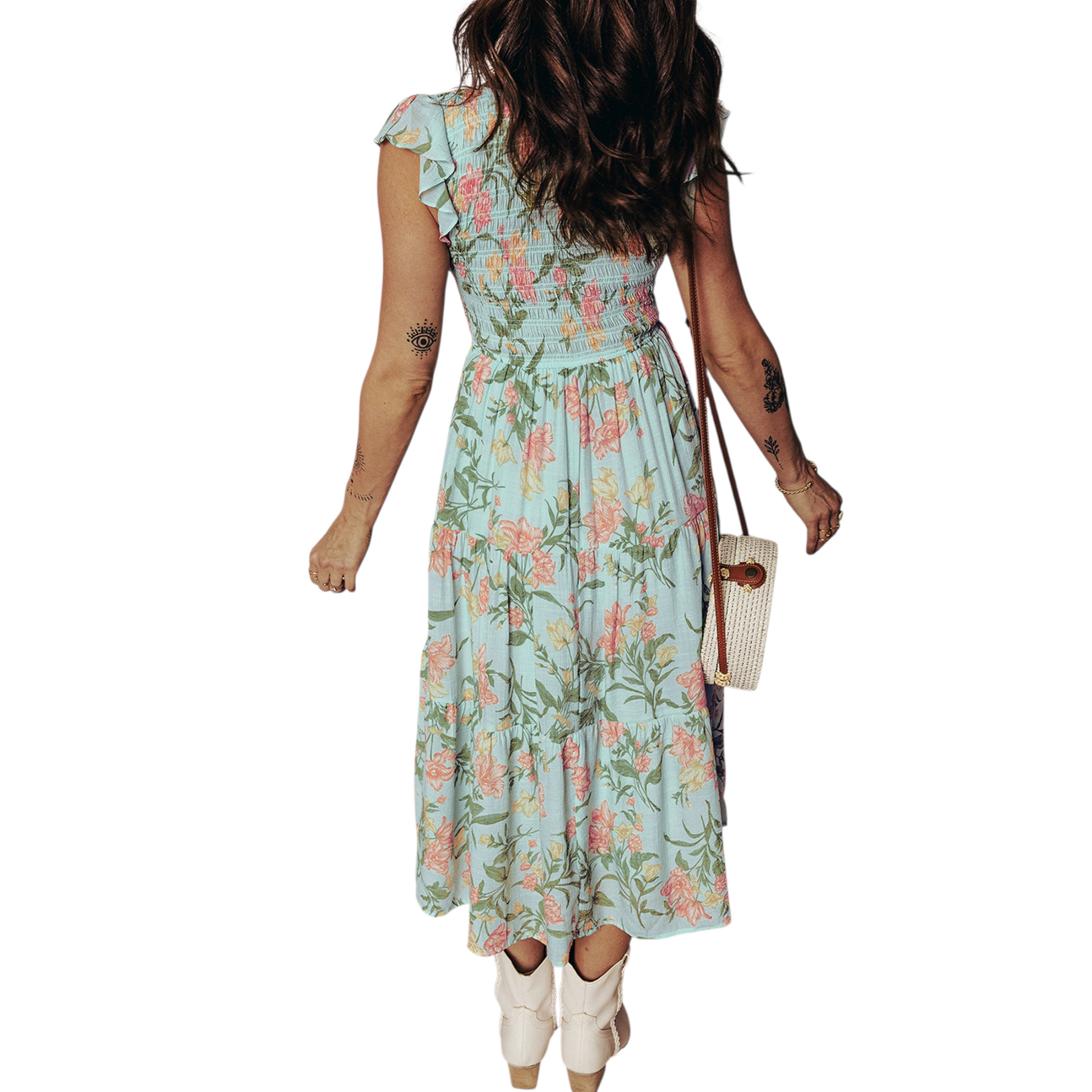 A tiered mint green maxi dress with a pastel floral print, featuring a smocked bodice and ruffled cap sleeves. Back view.