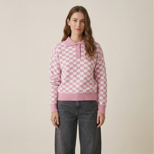 Pink checkerboard polo knit jumper front view showing polo collar and button placket detail