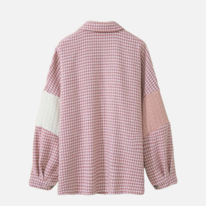 Back view of a pink and white houndstooth and cable-knit patchwork shacket, showcasing a relaxed fit.