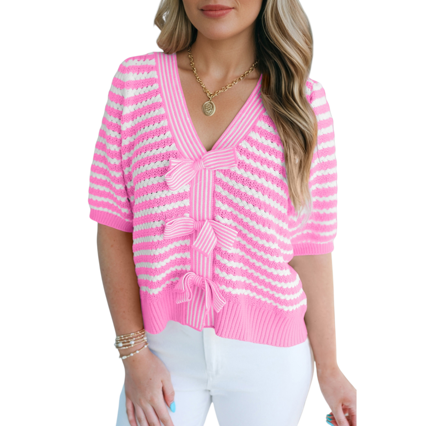 Model wearing a pink and white striped short-sleeve knit sweater featuring three decorative bow knots and a V-neckline.