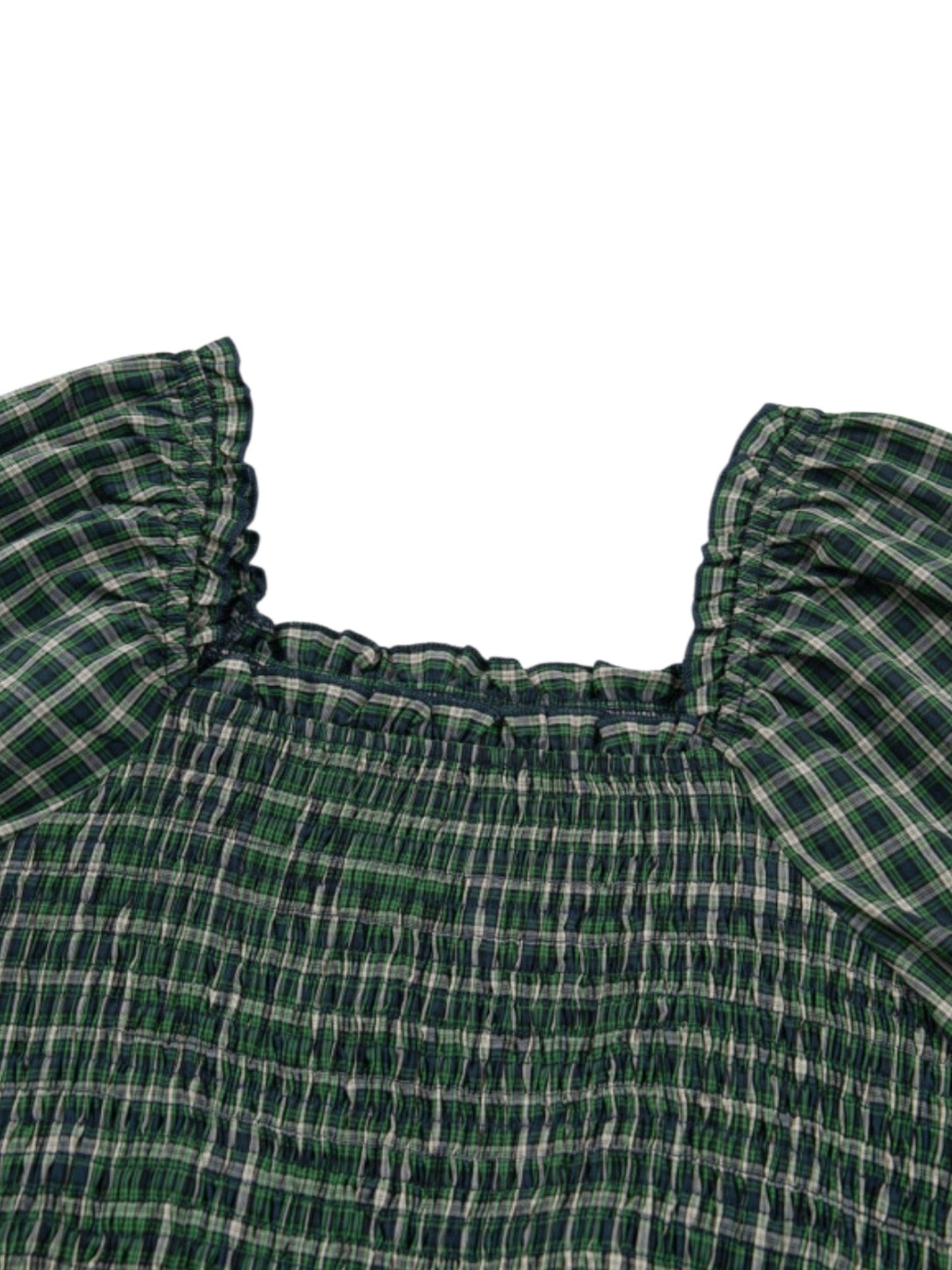Green plaid fabric with ruffled edges on a white background