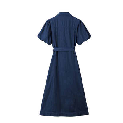 Professional back view of the 100% cotton denim midi dress in deep blue, highlighting the elasticated puff sleeves and tailored fit.