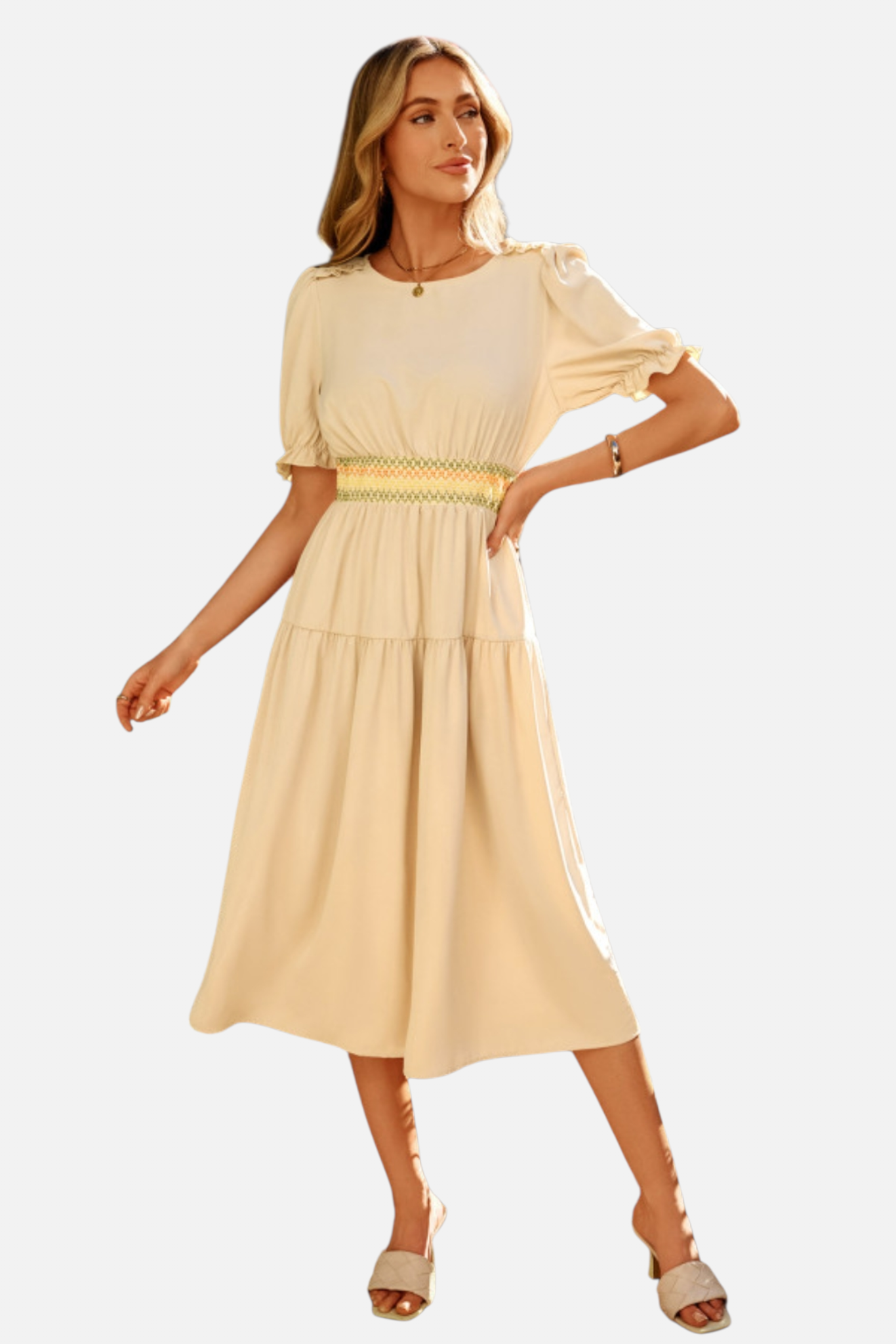 Woman wearing a beige dress with a belt on a white background