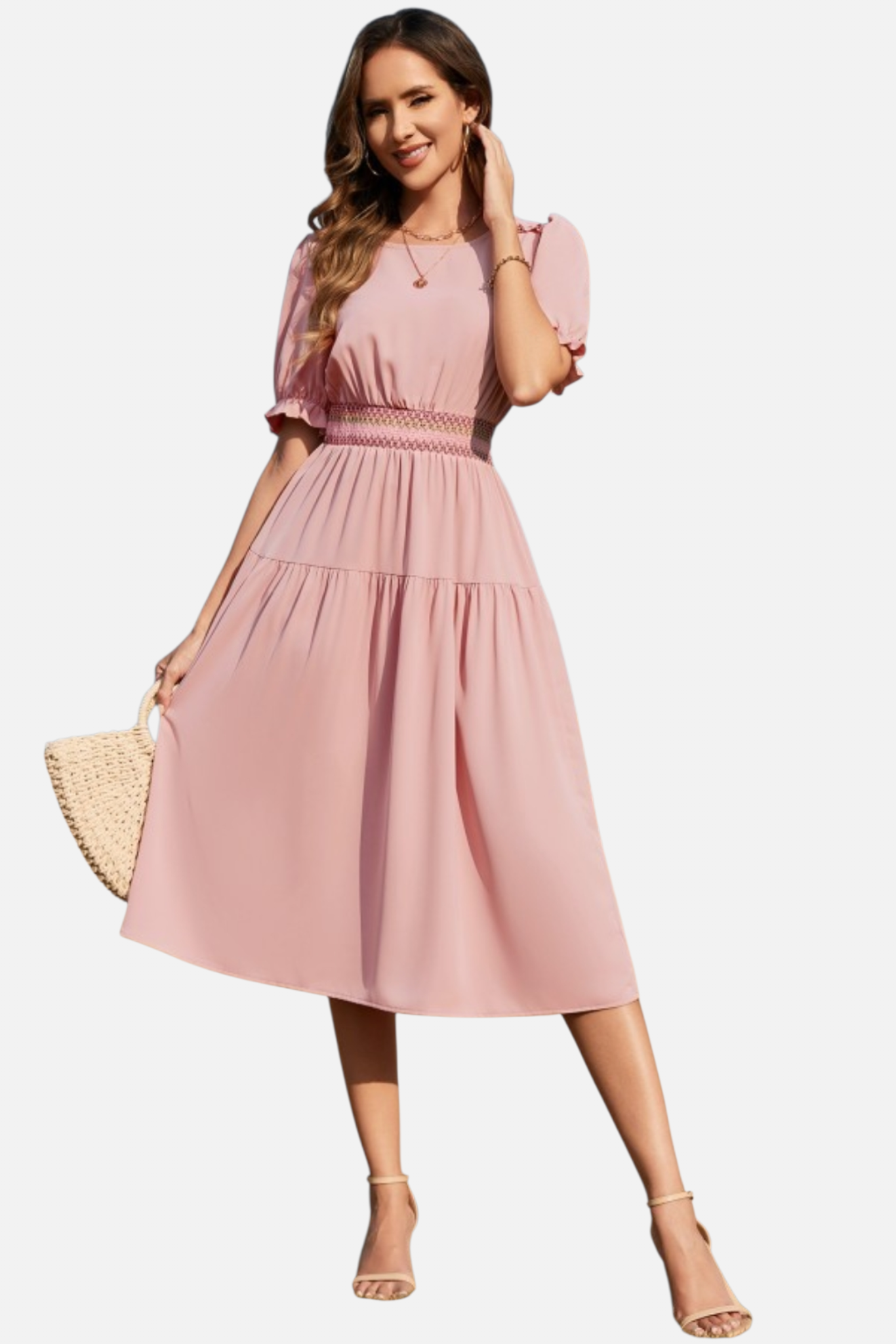 Woman wearing a pink dress on a white background
