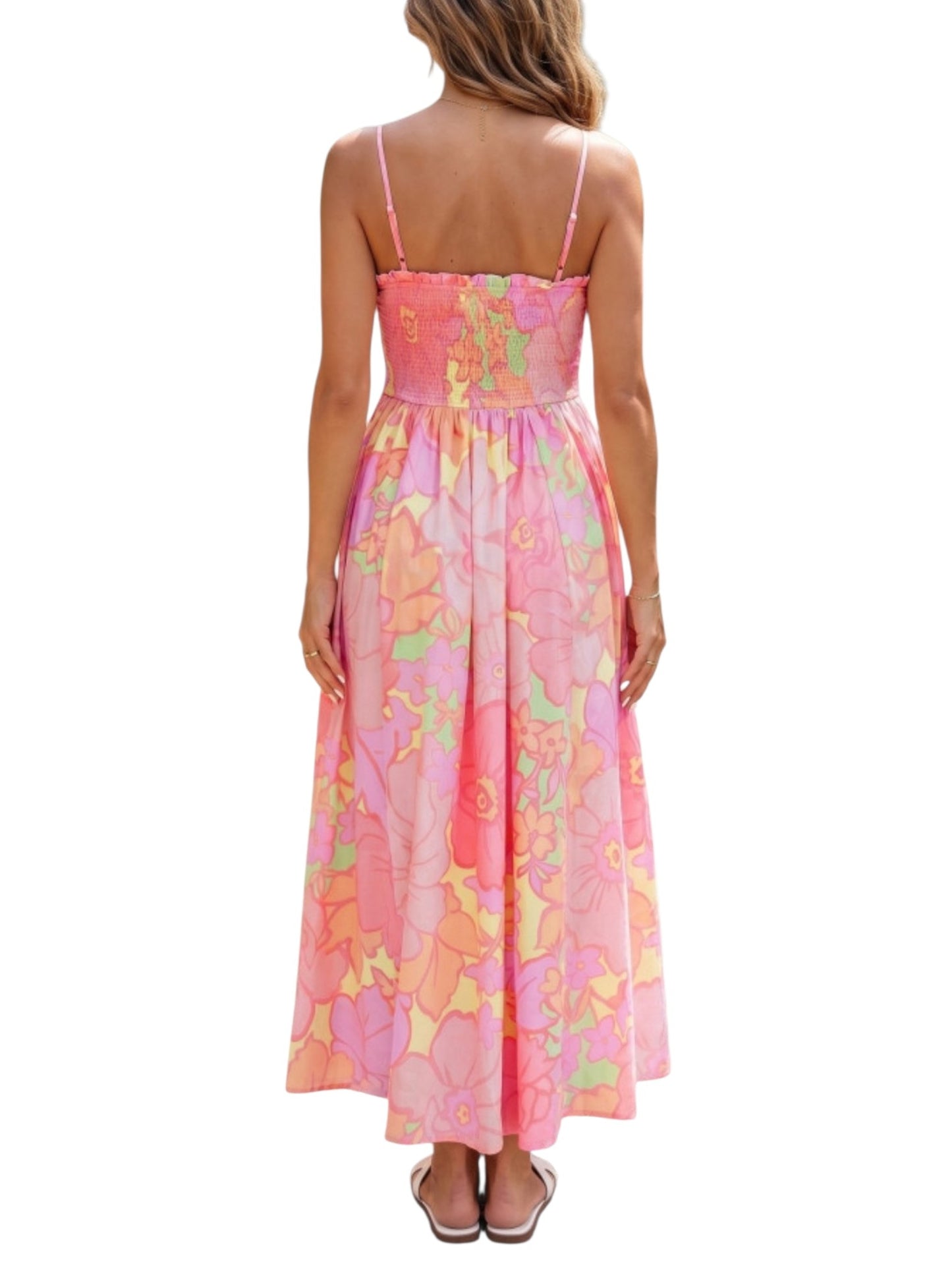 Woman wearing a pink floral dress on a white background back view
