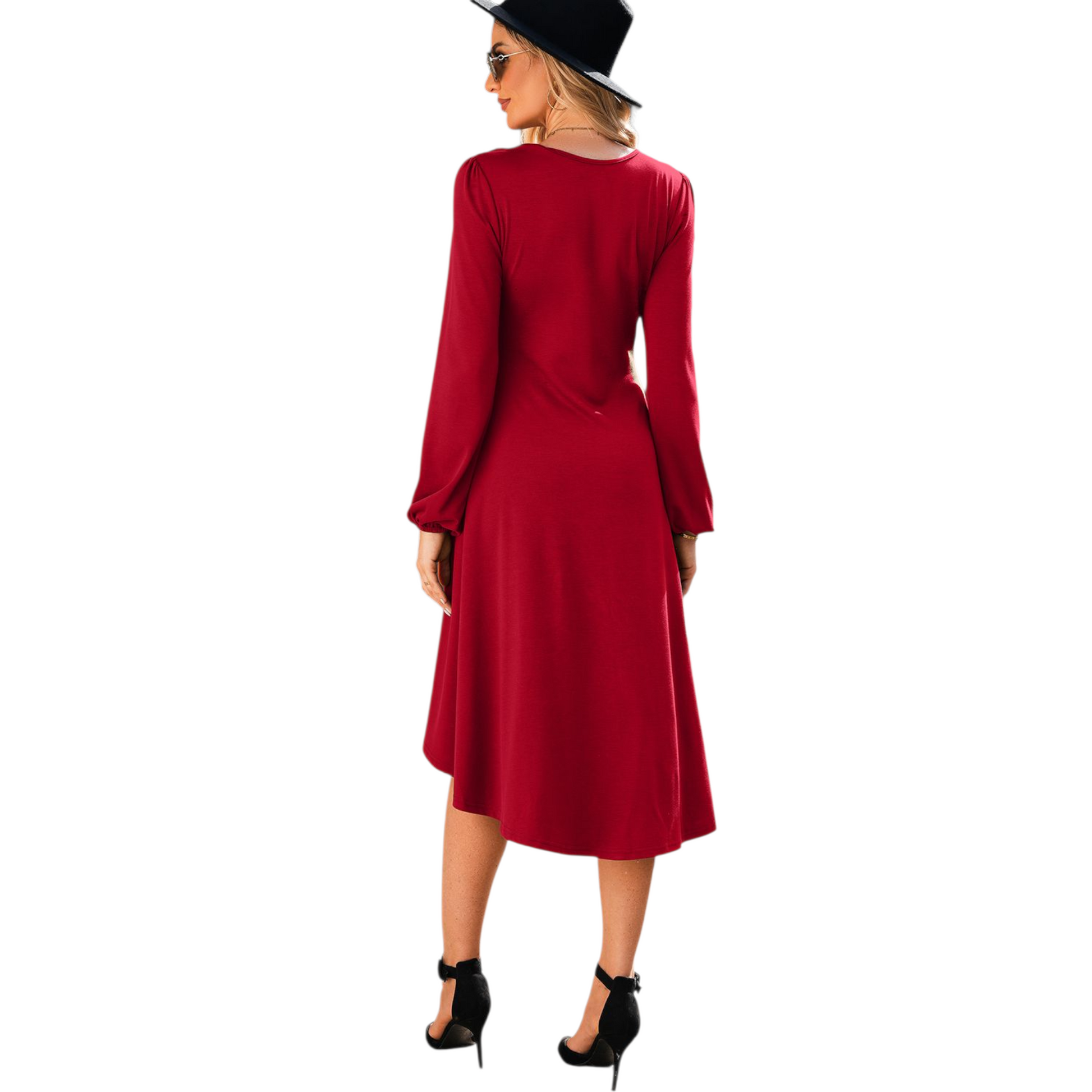 Woman wearing a red dress and black hat on a white background
