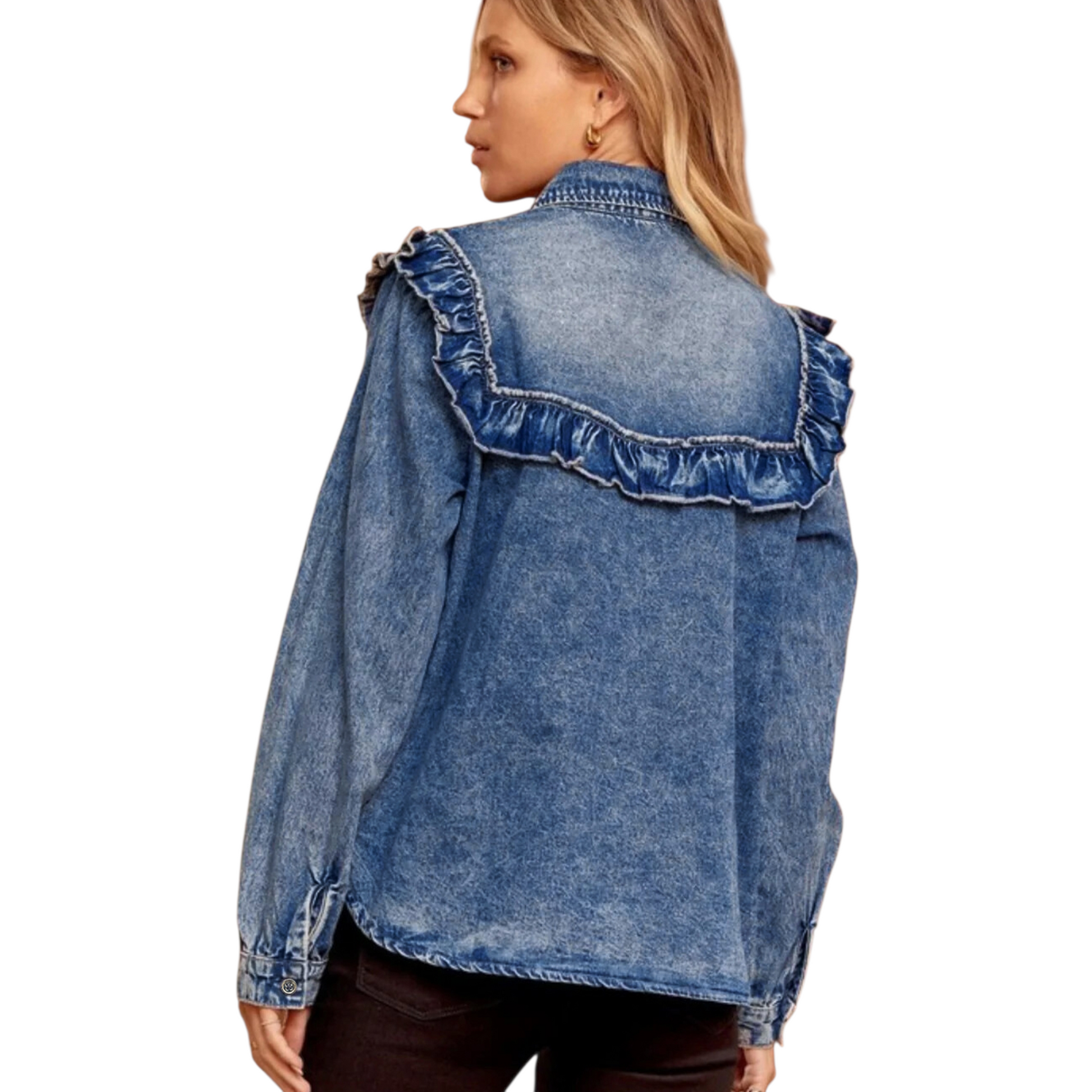 Rear view of a ruffle denim shirt highlighting the feminine ruffle trim across the back yoke and long sleeves.