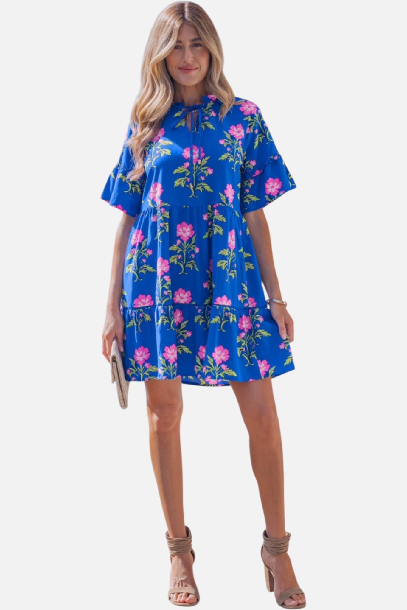 Full-length front view of the cobalt blue floral tiered dress, showcasing the breezy cotton-blend fabric and playful mini length.