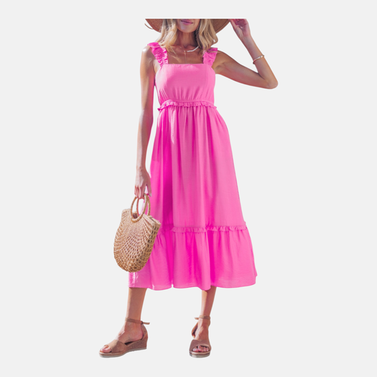 Vibrant pink tiered midi dress with ruffled shoulder straps and a high-waist silhouette, perfect for summer weddings or garden parties.