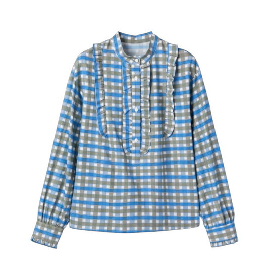 Front view of a sky blue and grey plaid blouse featuring ruffle trim on the placket and a half-button closure.