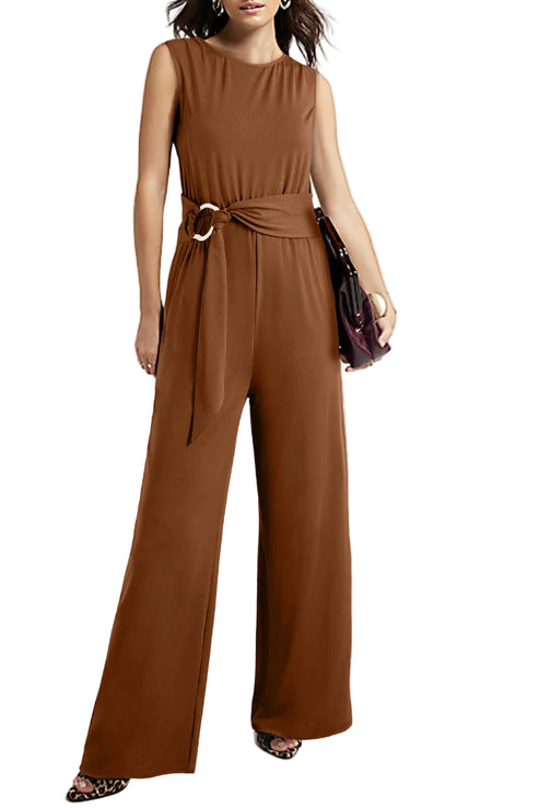 Woman wearing a brown jumpsuit on a white background