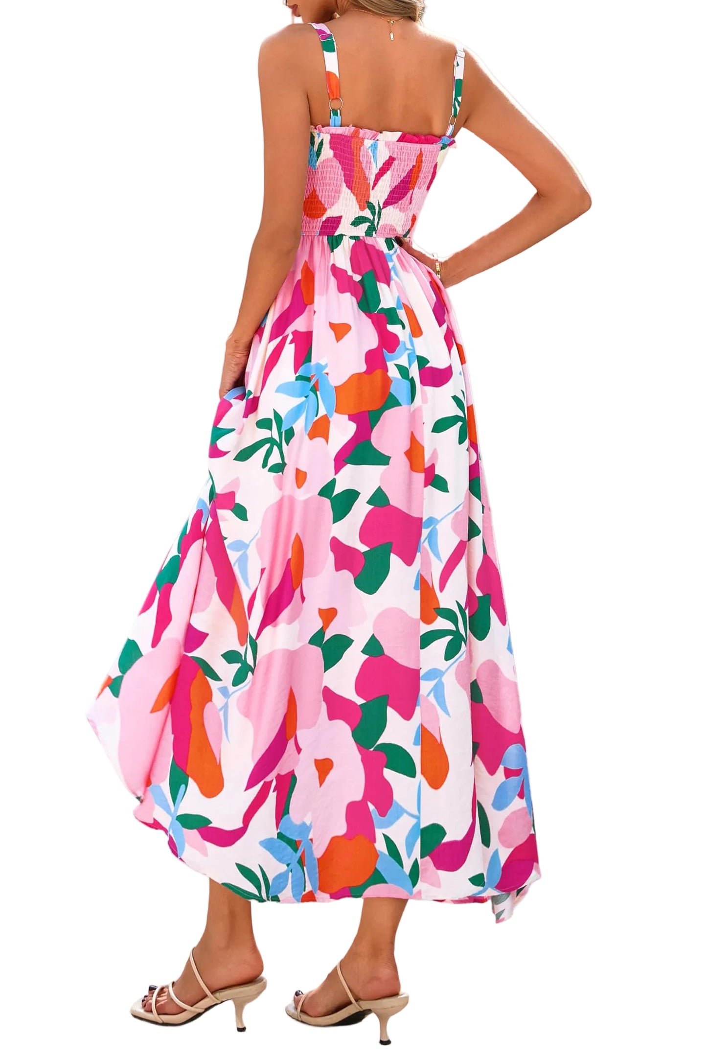 Rear view highlighting the stretchy smocked back panel and adjustable shoulder straps of the bright floral sundress.