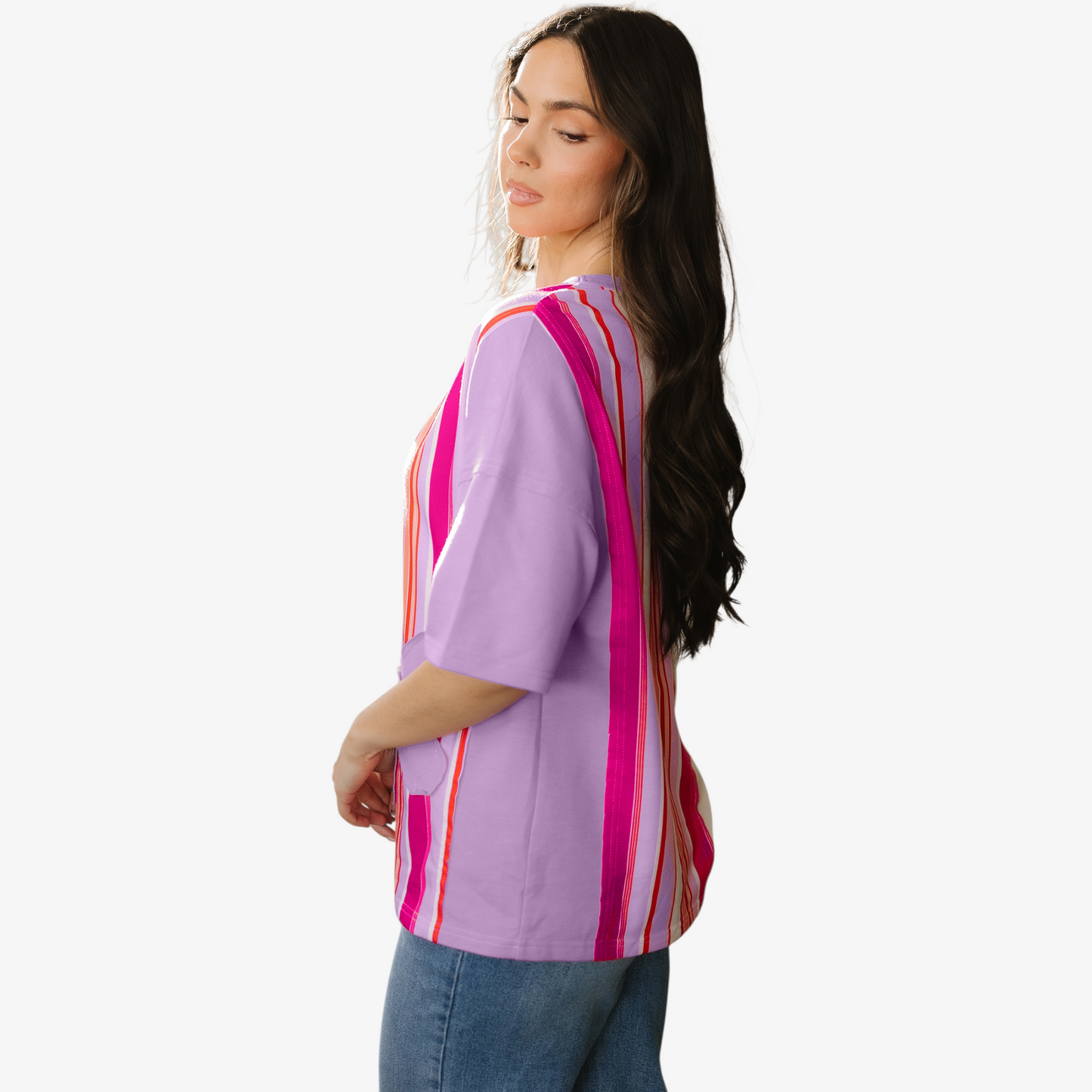 Woman wearing a purple and pink striped shirt on a white background