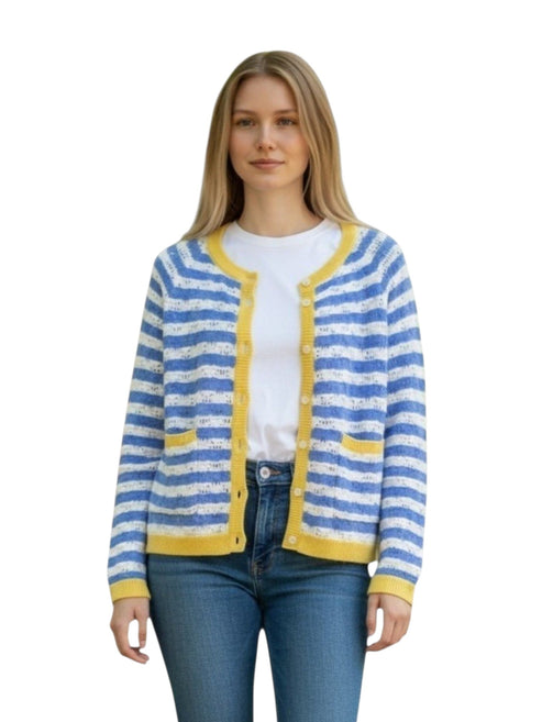 A woman modeling a blue and white striped knit cardigan with yellow trim over a white t-shirt and blue jeans, shot against a solid white background.