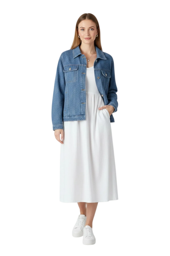 A model wearing a textured button-down jacket over a white midi dress, showcasing a versatile and relaxed outfit for everyday wear.