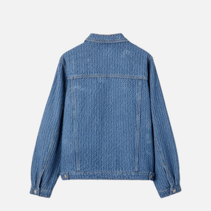 Rear view of the textured blue cotton-blend jacket, highlighting its clean, relaxed silhouette and sophisticated seam detailing.