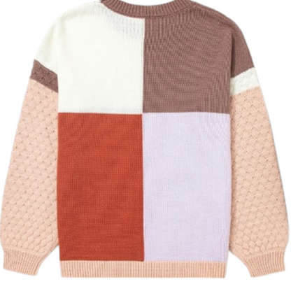 Color-blocked sweater with a patchwork design on a white background