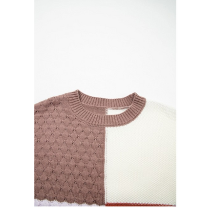 Two-tone sweater with brown and white sections on a white background