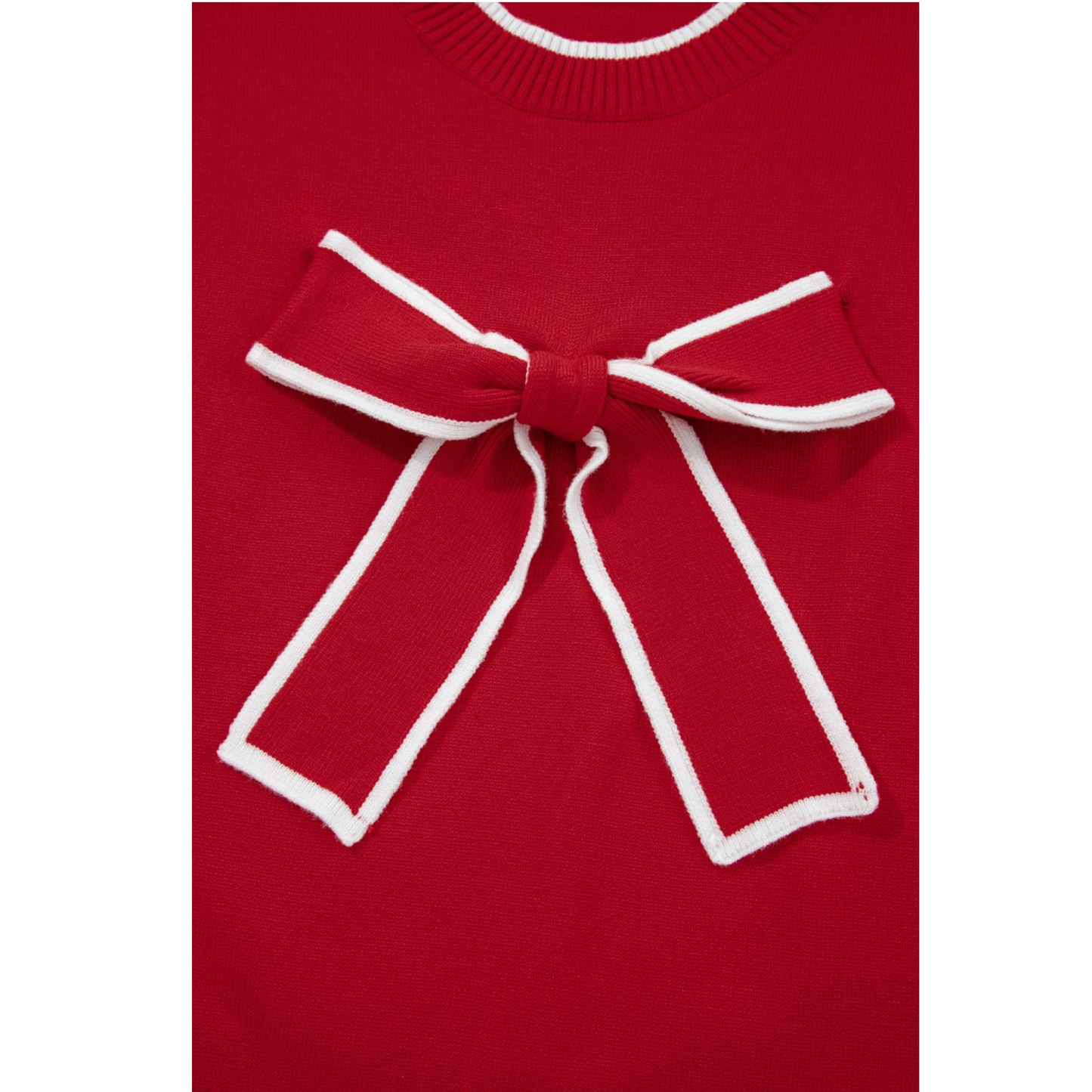 Red sweater with a large white bow on a white background