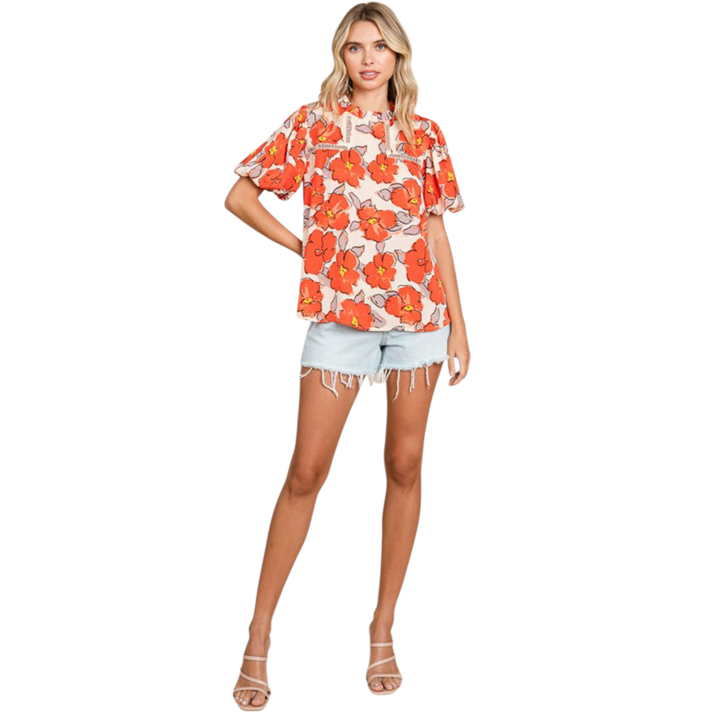 Full front view of a vibrant floral print blouse with bubble sleeves and a ruffle high-neck collar.