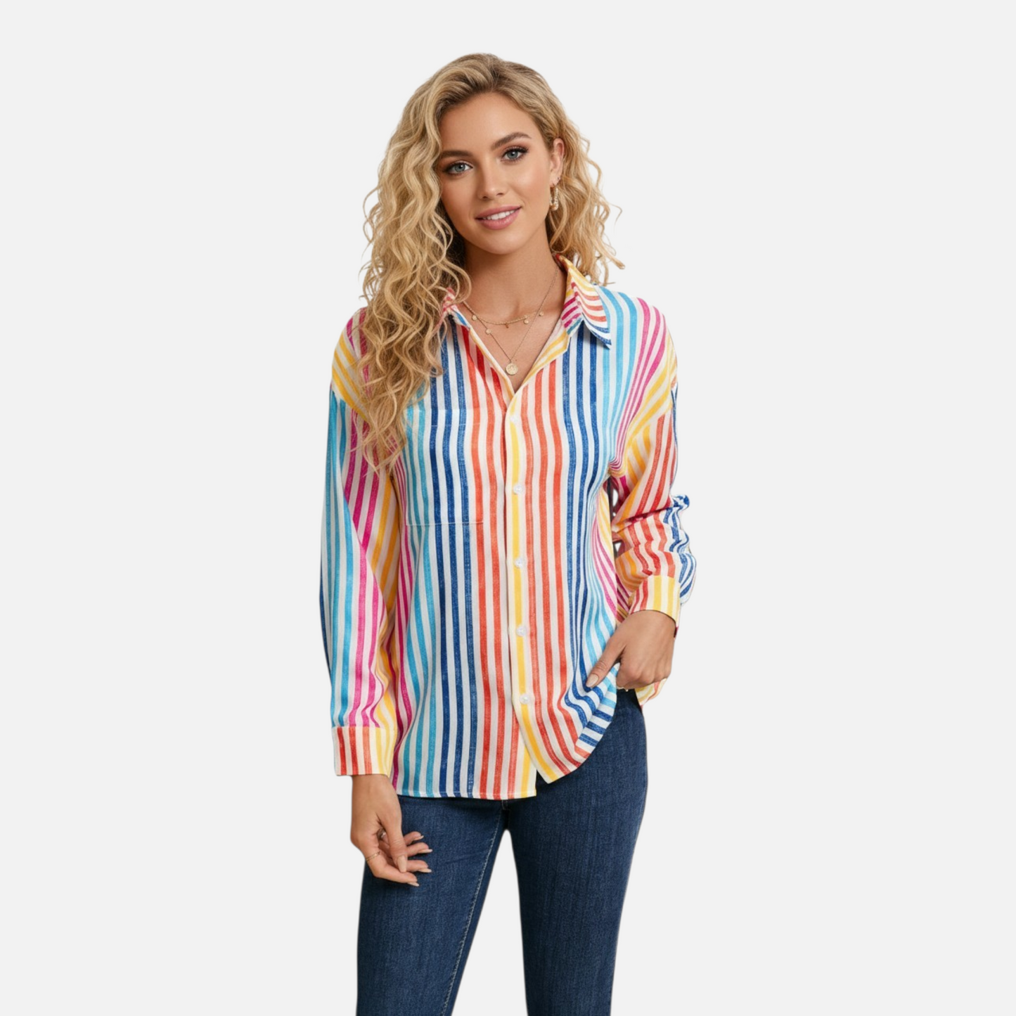 Front view of a woman wearing a vibrant vertical stripe shirt with a drop shoulder design and multicolour rainbow patterns.