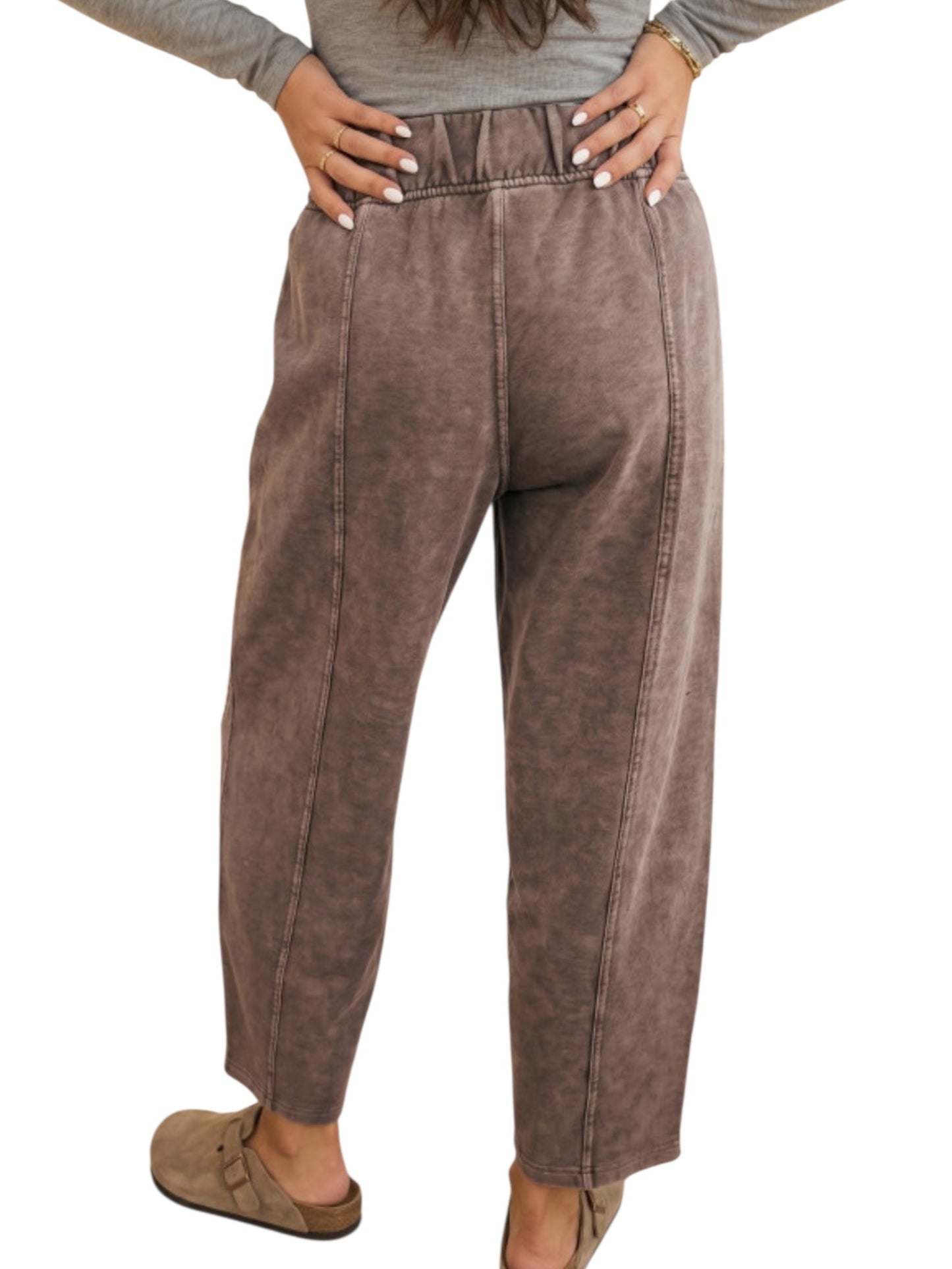 Washed cotton barrel leg pants in brown, back view