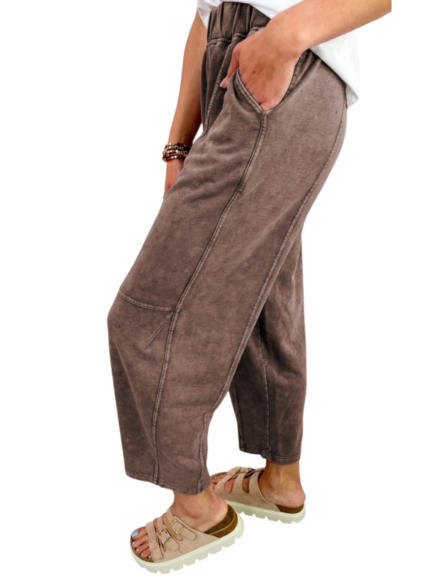 Washed cotton barrel leg pants in brown, side view