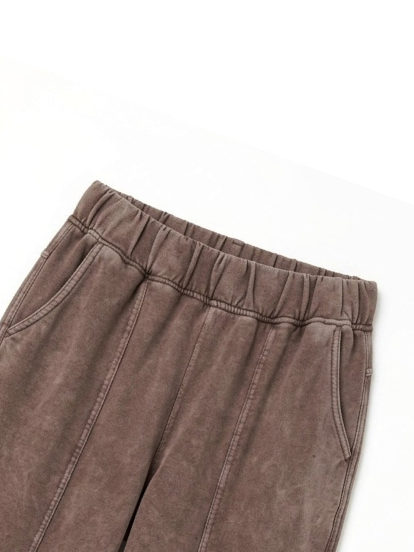 Washed cotton barrel leg pants in brown, waistline front view