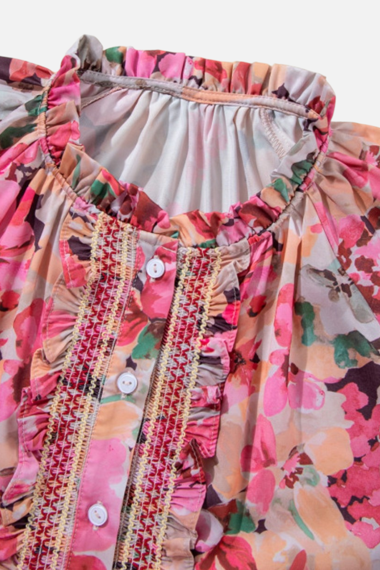Floral dress with ruffled details on a white background