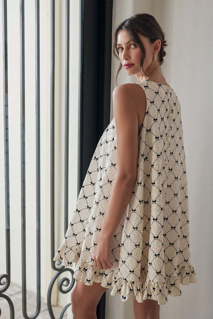Side view of White Bow Sleeveless Mini Dress with Ruffle Hem.