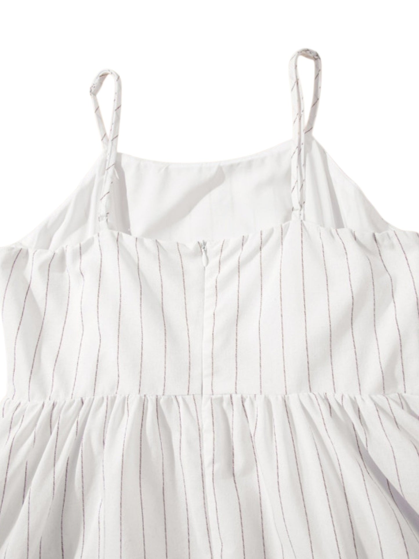 White striped dress with thin straps on a white background