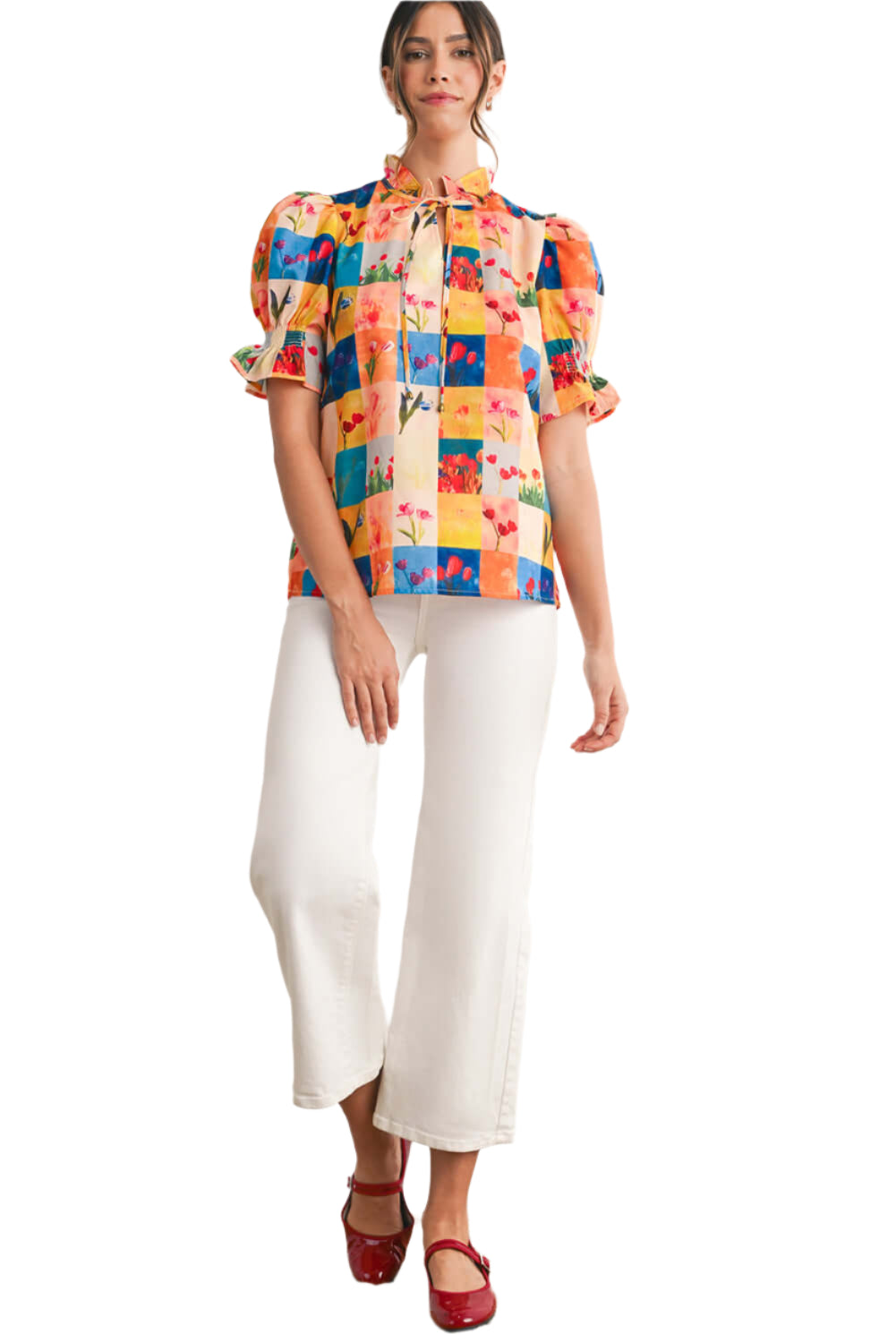 Women wearing a multicolour floral checked blouse with short puff sleeves, ideal for summer casual occasions.