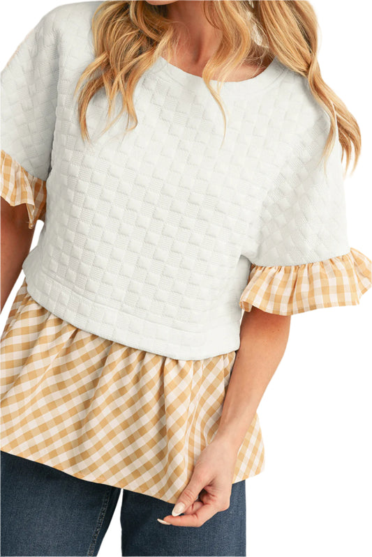 White and yellow white patchwork blouse with sleeves.