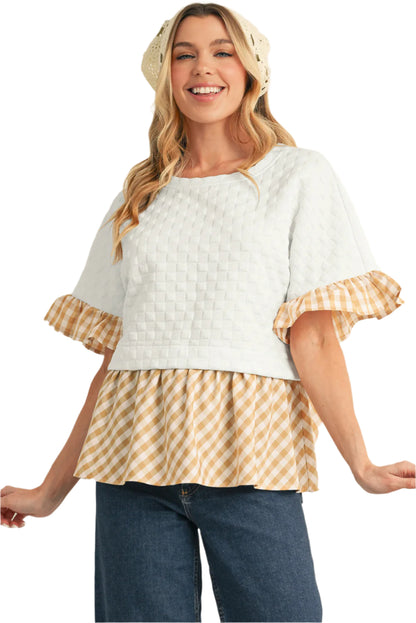 Stylish white and yellow patchwork blouse with sleeves.