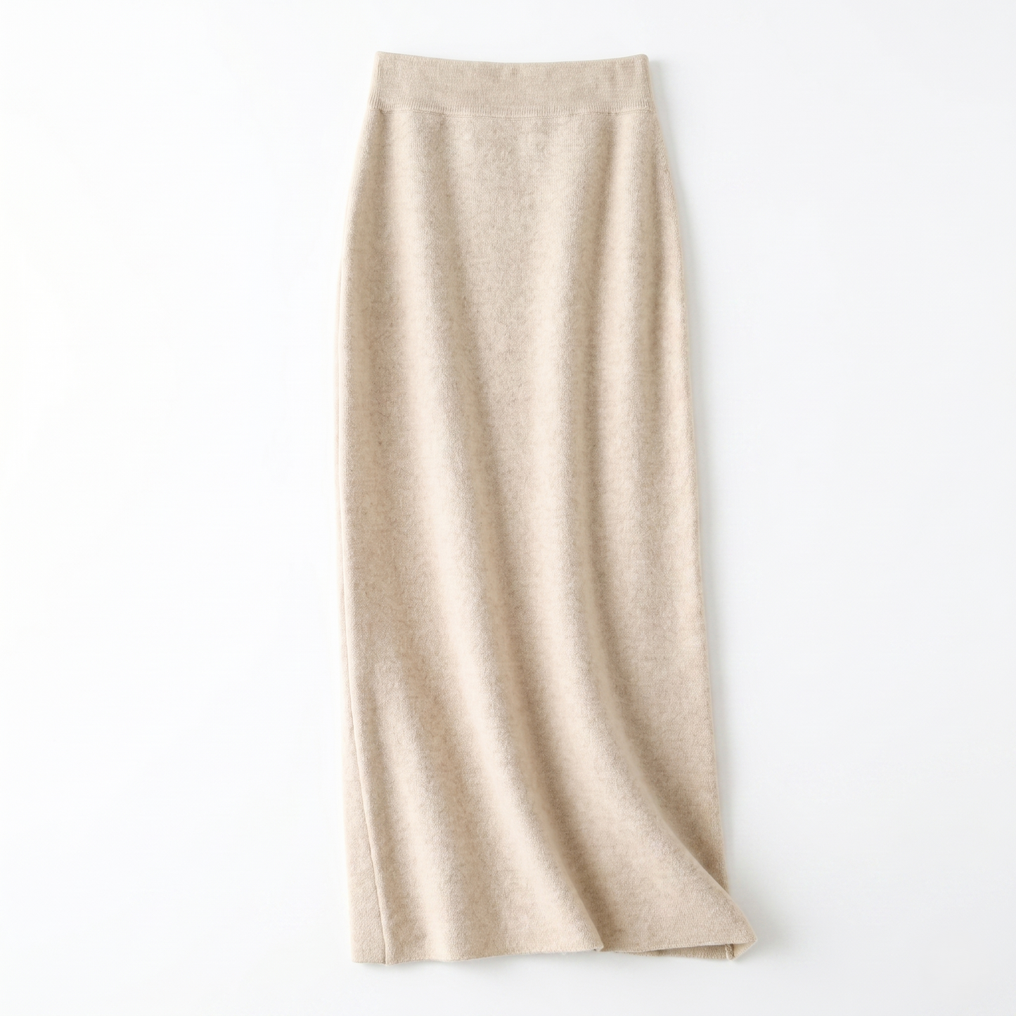 Front flat lay view of a soft beige high-waisted wool-blend knit midi skirt showing its soft texture.